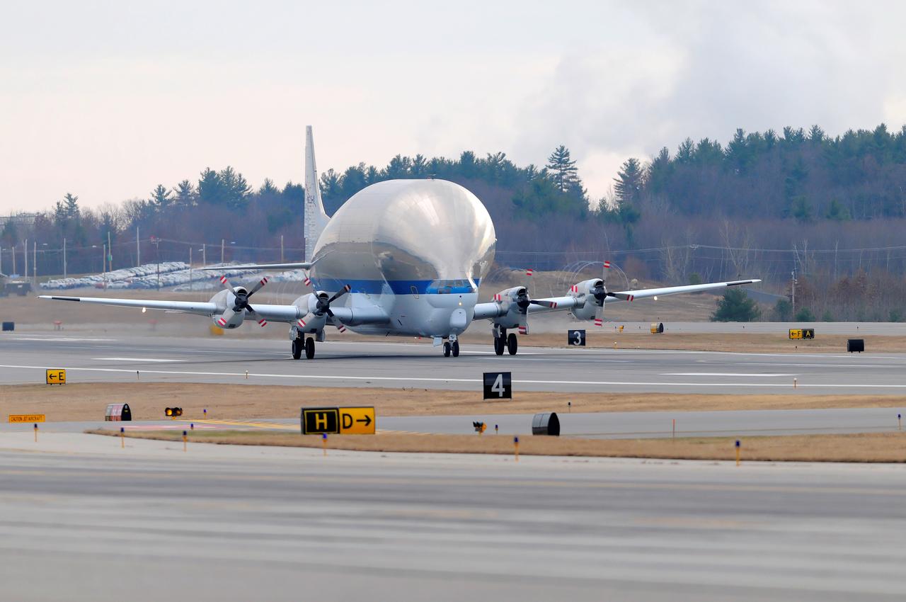 NASA's Super Guppy transport plane transports the Exploration Flight Test-1 (EFT-1) Orion heat shield from Manchester, NH to the Kennedy Space Center in Florida on Dec. 4, 2013. Part of Batch image transfer from Flickr.