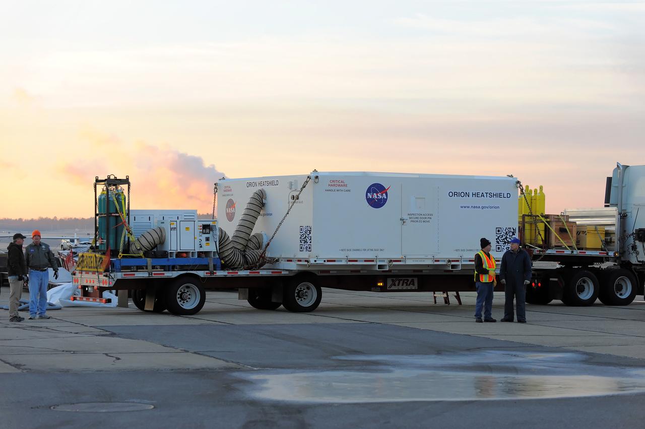 NASA's Super Guppy transport plane transports the Exploration Flight Test-1 (EFT-1) Orion heat shield from Manchester, NH to the Kennedy Space Center in Florida on Dec. 4, 2013. Part of Batch image transfer from Flickr.