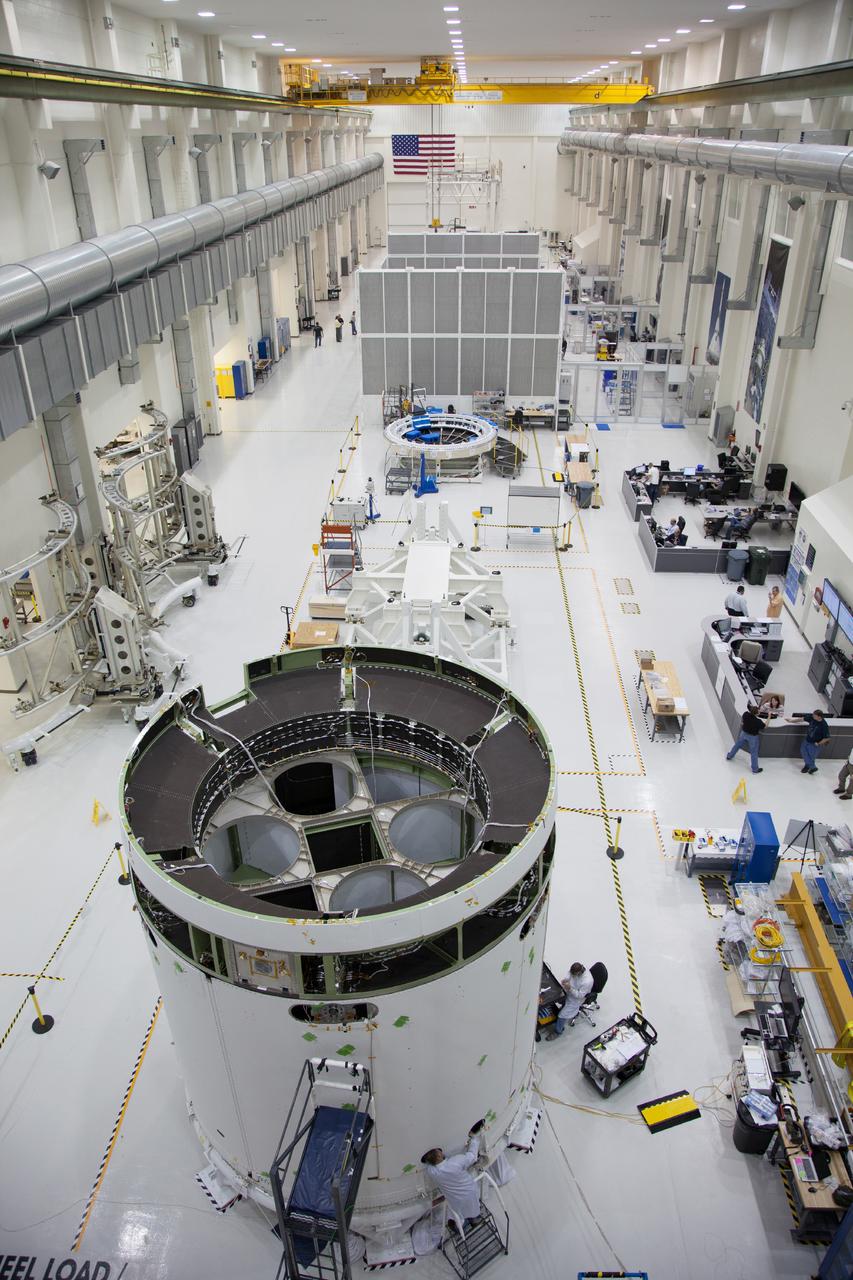 The spacecraft adapter jettison fairing panels are installed on the Exploration Flight Test-1 (EFT-1) Orion service module in the Operations and Checkout (O&amp;C) Building at Kennedy Space Center on Jan. 14 , 2014. Part of Batch image transfer from Flickr.