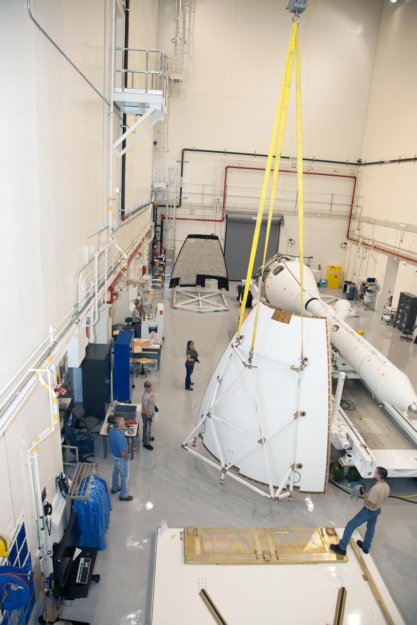 The launch abort system ogive panels are prepared for installation onto the Orion Exploration Flight Test-1 (EFT-1) launch abort system in the Launch Abort System Facility (LASF) at Kennedy Space Center on April 16, 2014. Part of Batch image transfer from Flickr.