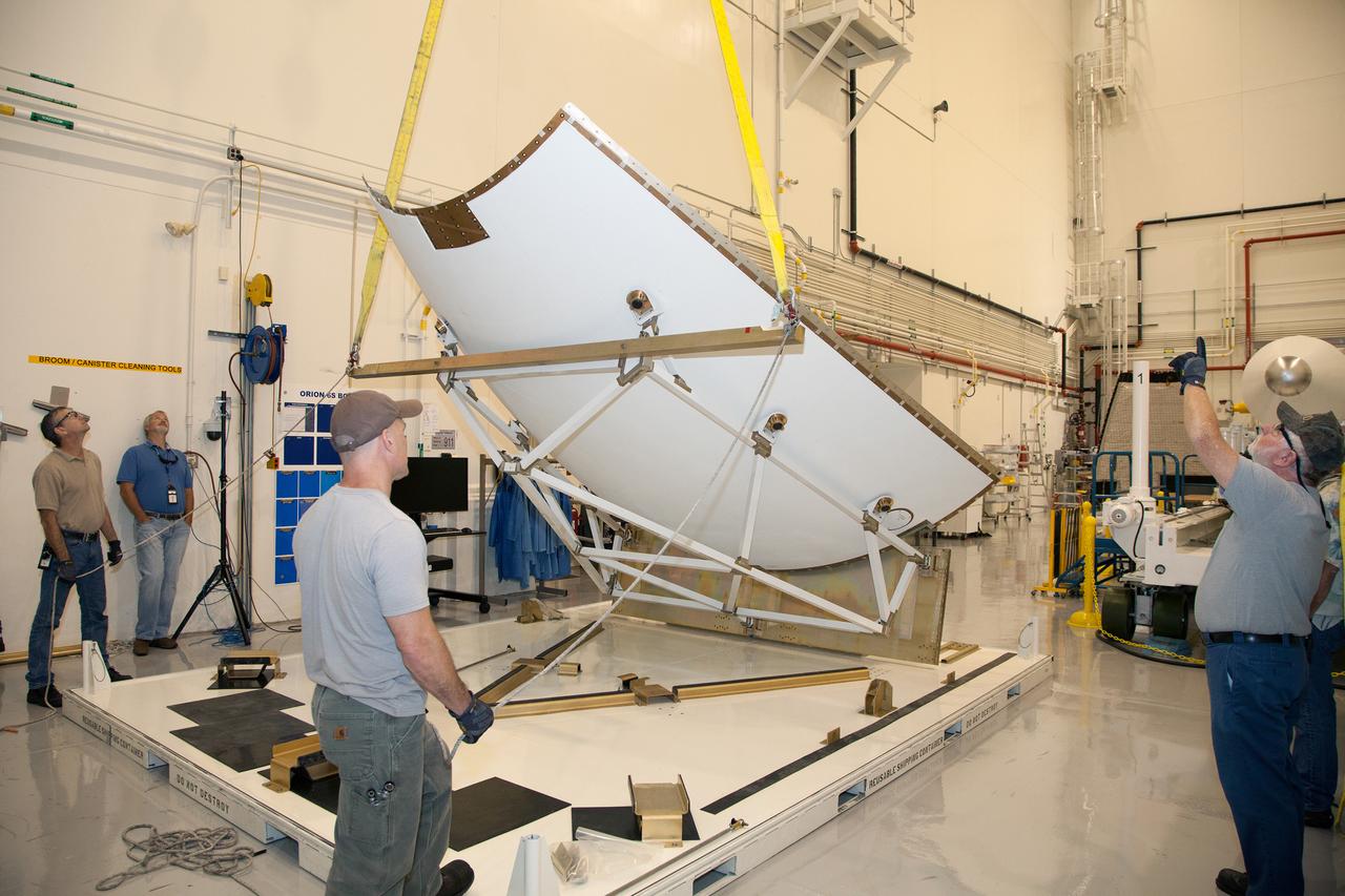 The launch abort system ogive panels are prepared for installation onto the Orion Exploration Flight Test-1 (EFT-1) launch abort system in the Launch Abort System Facility (LASF) at Kennedy Space Center on April 16, 2014. Part of Batch image transfer from Flickr.
