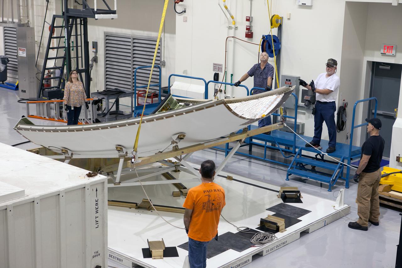 The launch abort system ogive panels are prepared for installation onto the Orion Exploration Flight Test-1 (EFT-1) launch abort system in the Launch Abort System Facility (LASF) at Kennedy Space Center on April 16, 2014. Part of Batch image transfer from Flickr.
