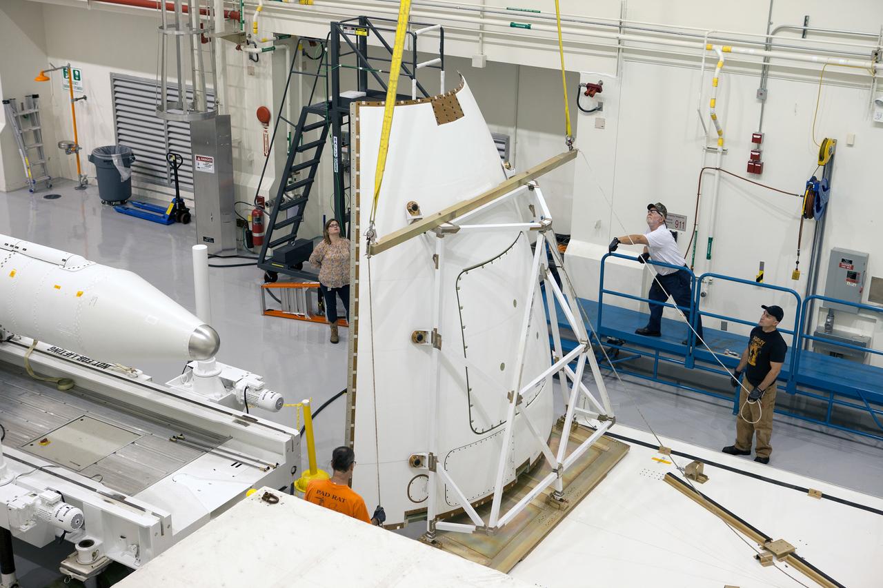The launch abort system ogive panels are prepared for installation onto the Orion Exploration Flight Test-1 (EFT-1) launch abort system in the Launch Abort System Facility (LASF) at Kennedy Space Center on April 16, 2014. Part of Batch image transfer from Flickr.