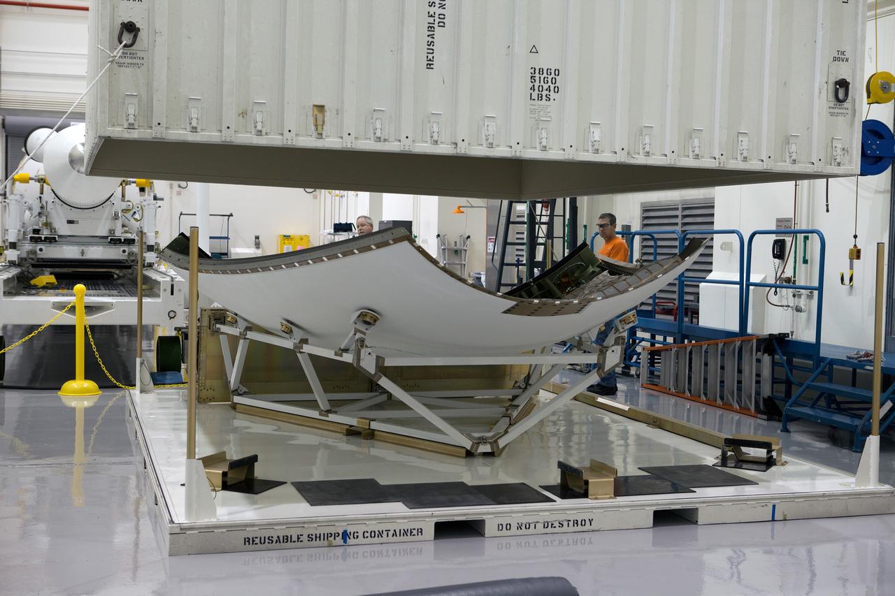 The launch abort system ogive panels are prepared for installation onto the Orion Exploration Flight Test-1 (EFT-1) launch abort system in the Launch Abort System Facility (LASF) at Kennedy Space Center on April 16, 2014. Part of Batch image transfer from Flickr.