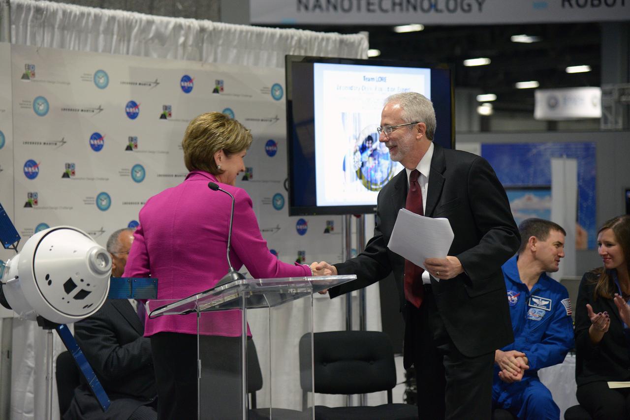 The winner of the high school portion of the Exploration Design Challenge is announced at the USA Science and Engineering Festival in Washington on April 25, 2014. Orion Program Manager Mark Geyer presents award. Part of Batch image transfer from Flickr.
