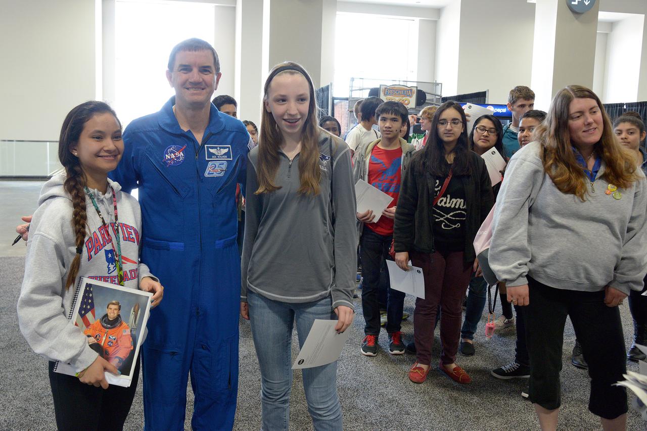 The winner of the high school portion of the Exploration Design Challenge is announced at the USA Science and Engineering Festival in Washington on April 25, 2014. Astronaut Rex Walheim is photographed with students. Part of Batch image transfer from Flickr.