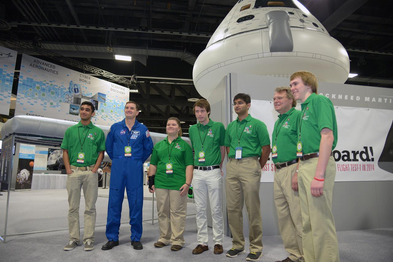 The winner of the high school portion of the Exploration Design Challenge is announced at the USA Science and Engineering Festival in Washington on April 25, 2014. Astronaut Rex Walheim poses for photo with students. Part of Batch image transfer from Flickr.