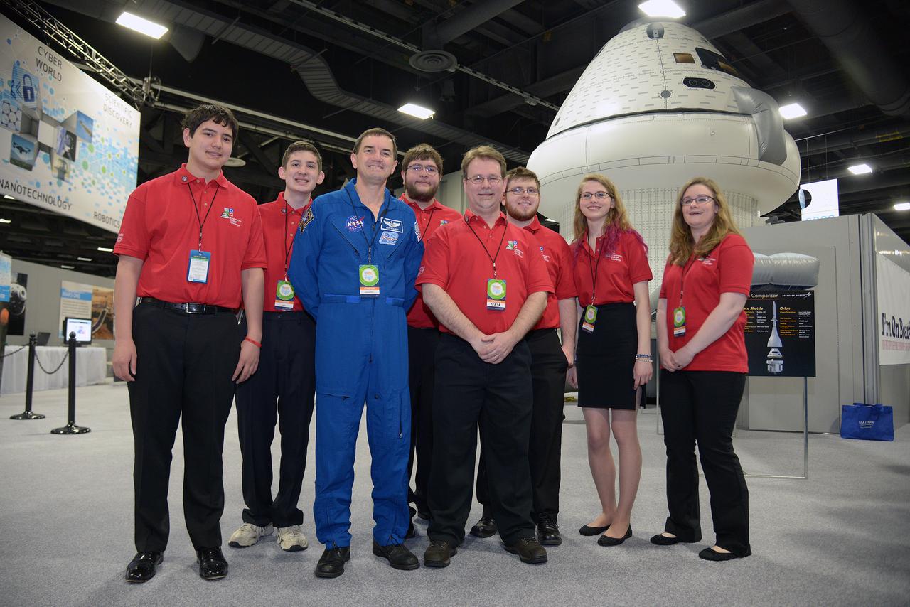 The winner of the high school portion of the Exploration Design Challenge is announced at the USA Science and Engineering Festival in Washington on April 25, 2014. Astronaut Rex Walheim poses for photo with students. Part of Batch image transfer from Flickr.