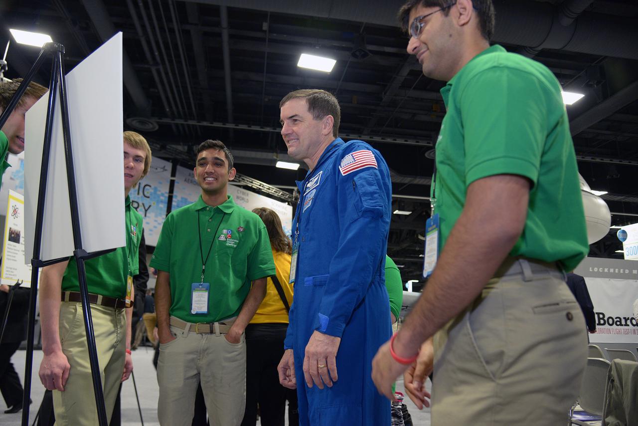 The winner of the high school portion of the Exploration Design Challenge is announced at the USA Science and Engineering Festival in Washington on April 25, 2014. Astronaut Rex Walheim talks with students. Part of Batch image transfer from Flickr.