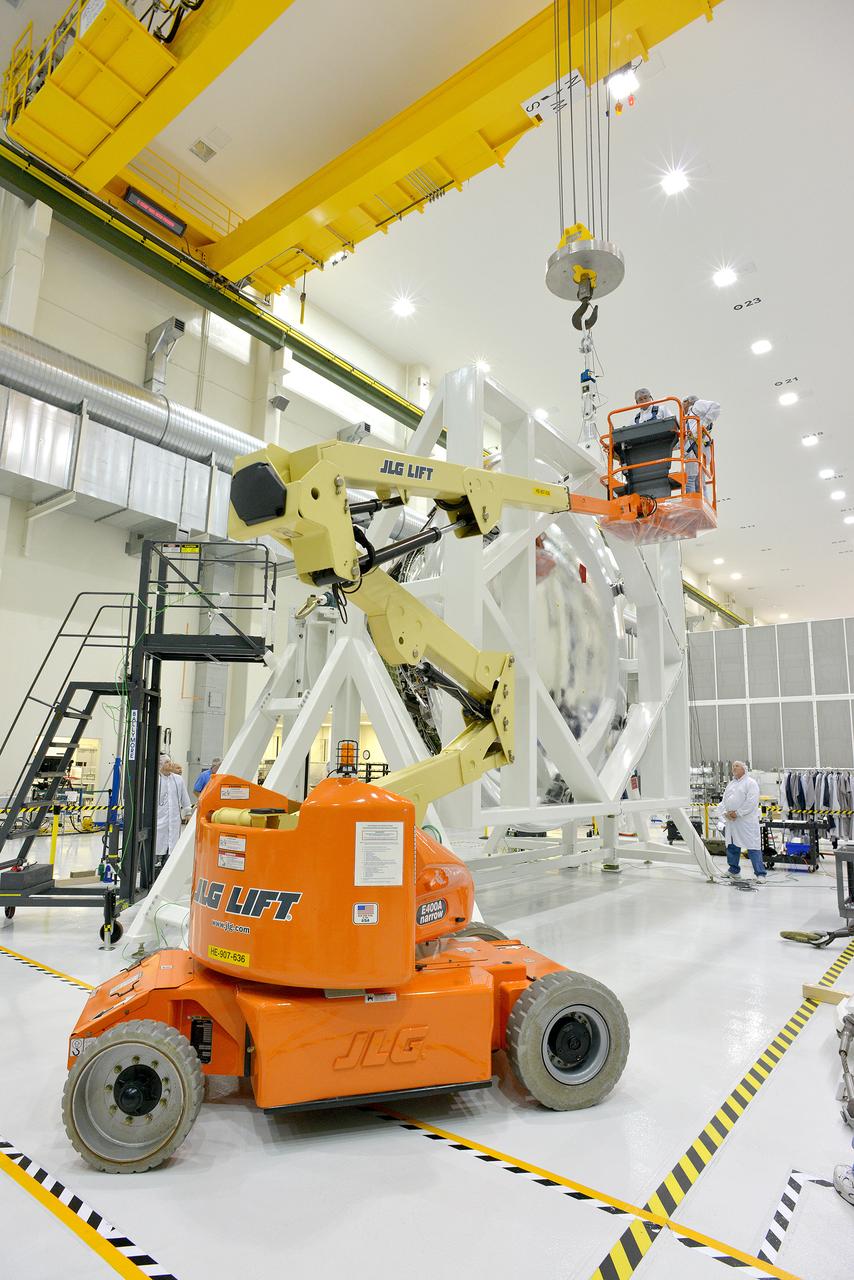 An Orion weight and center of gravity test with the Exploration Flight Test-1 (EFT-1) crew module takes place at the Operations and Checkout (O&amp;C) Building at Kennedy Space Center on June 8, 2014. Part of Batch image transfer from Flickr.