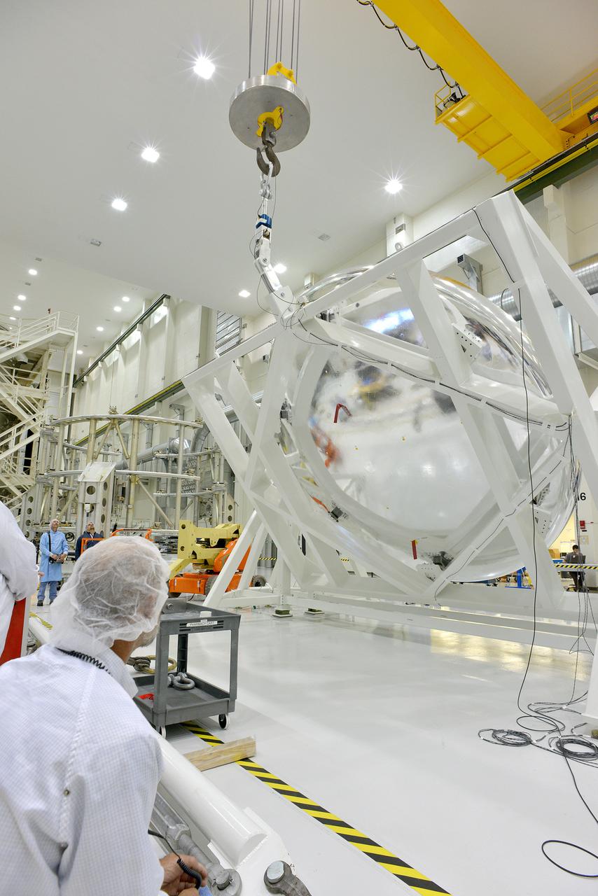 An Orion weight and center of gravity test with the Exploration Flight Test-1 (EFT-1) crew module takes place at the Operations and Checkout (O&amp;C) Building at Kennedy Space Center on June 8, 2014. Part of Batch image transfer from Flickr.