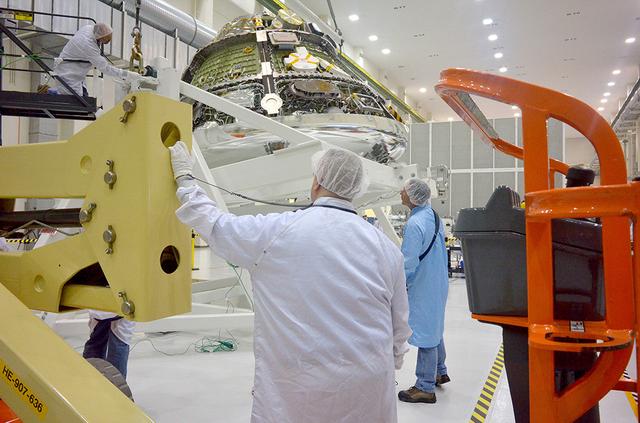 An Orion weight and center of gravity test with the Exploration Flight Test-1 (EFT-1) crew module takes place at the Operations and Checkout (O&amp;C) Building at Kennedy Space Center on June 8, 2014. Part of Batch image transfer from Flickr.