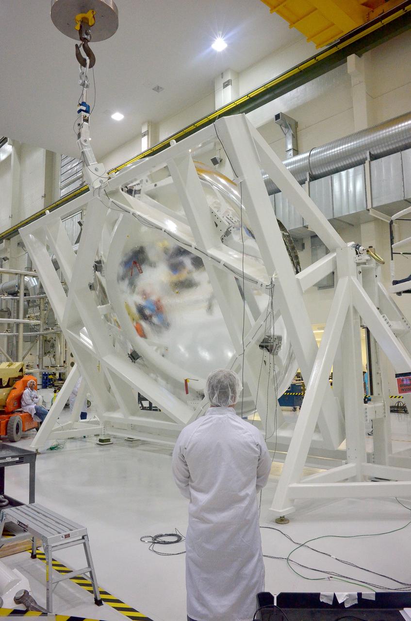 An Orion weight and center of gravity test with the Exploration Flight Test-1 (EFT-1) crew module takes place at the Operations and Checkout (O&C) Building at Kennedy Space Center on June 8, 2014. Part of Batch image transfer from Flickr.