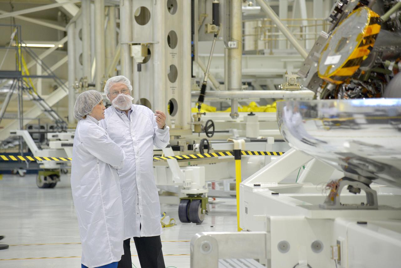 Astronaut Anna Fisher observes Orion Exploration Flight Test-1 (EFT-1) crew module and service module mating operations in Operations and Checkout (O&amp;C) Building at Kennedy Space Center on June 9, 2014. Part of Batch image transfer from Flickr.