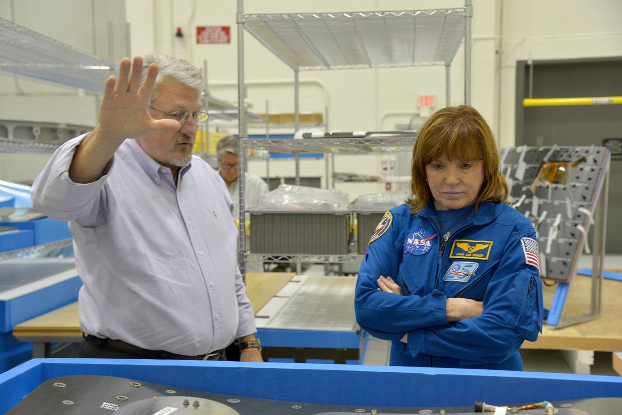 Astronaut Anna Fisher observes Orion Exploration Flight Test-1 (EFT-1) crew module and service module mating operations in Operations and Checkout (O&amp;C) Building at Kennedy Space Center on June 9, 2014. Part of Batch image transfer from Flickr.