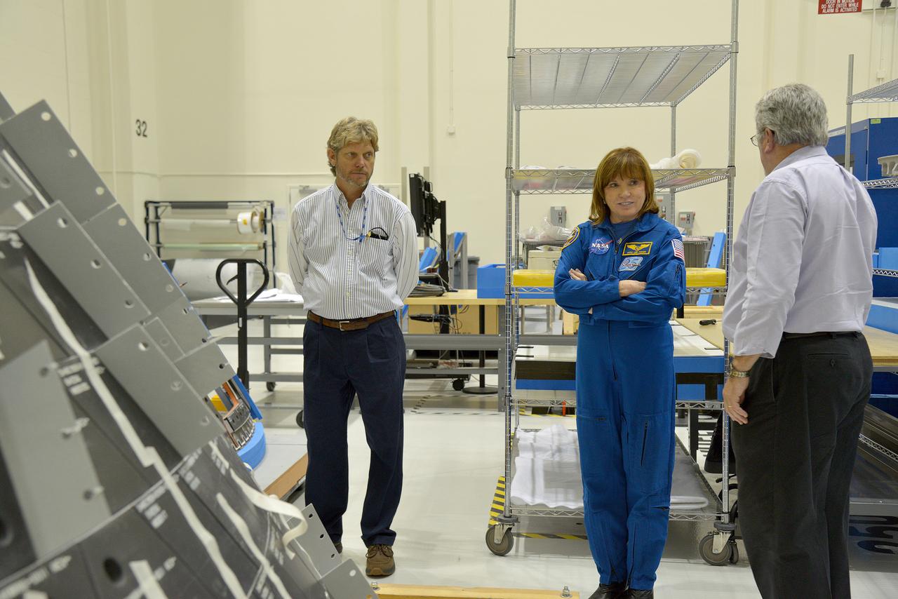 Astronaut Anna Fisher observes Orion Exploration Flight Test-1 (EFT-1) crew module and service module mating operations in Operations and Checkout (O&amp;C) Building at Kennedy Space Center on June 9, 2014. Part of Batch image transfer from Flickr.