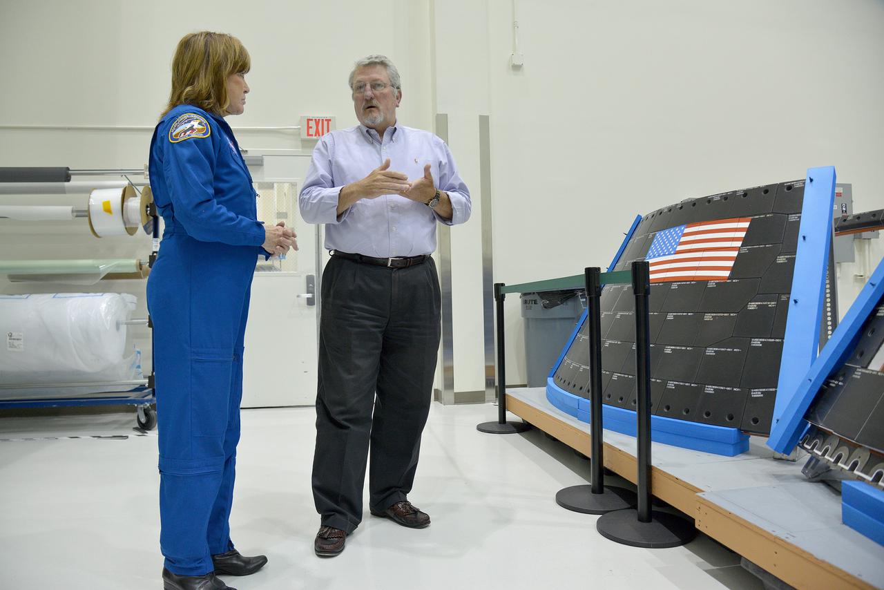 Astronaut Anna Fisher observes Orion Exploration Flight Test-1 (EFT-1) crew module and service module mating operations in Operations and Checkout (O&amp;C) Building at Kennedy Space Center on June 9, 2014. Part of Batch image transfer from Flickr.