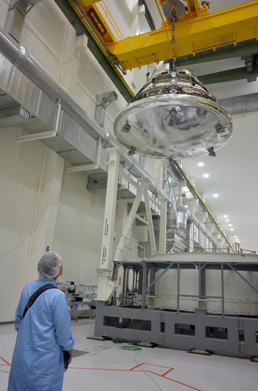  The Orion Exploration Flight Test-1 (EFT-1) crew module is moved and mated with the service module at the Operations and Checkout (O&amp;C) Building at Kennedy Space Center on June 9, 2014. Part of Batch image transfer from Flickr.