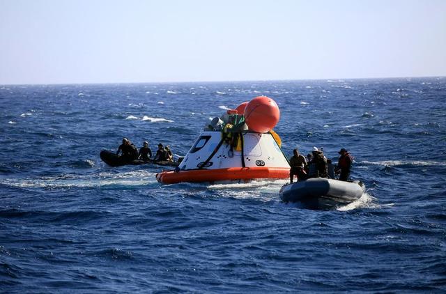 Orion recovery training and operations continue in the Pacific Ocean on Sept. 14, 2014. NASA and the Navy team on board the USS Salvor are evaluating procedures for pulling a test version of the spacecraft out of the ocean using the ship's crane.  Part of Batch image transfer from Flickr.
