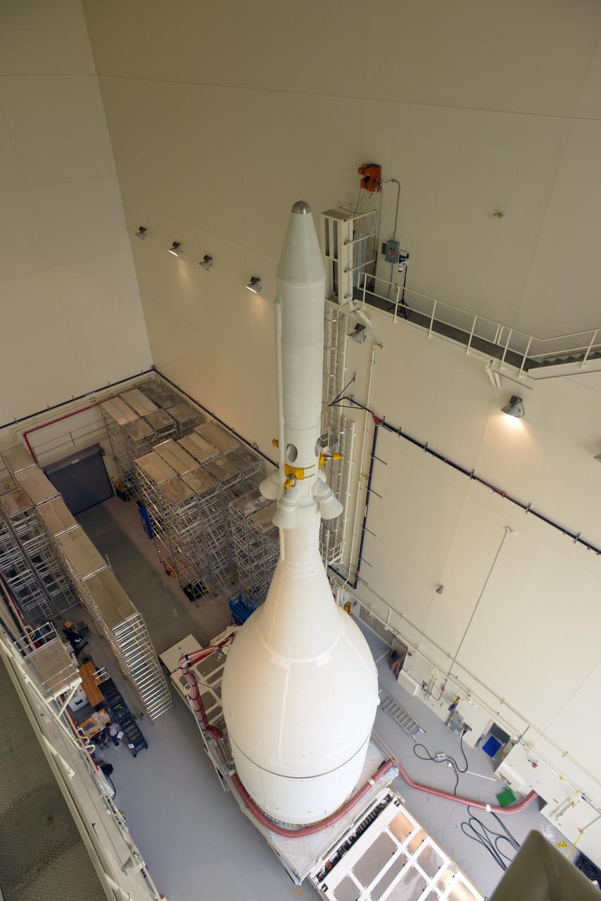 The Orion for Exploration Flight Test-1 (EFT-1) is stacked and ready to roll to the pad in the Launch Abort System Facility (LASF) at Kennedy Space Center on Nov. 10, 2014. The Orion stack, consisting of the launch abort system, the crew module, and the service module measures over 80 feet tall.  Part of Batch image transfer from Flickr.