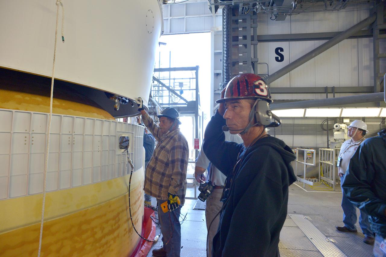 The Orion spacecraft was lifted on top of the Delta IV Heavy launch vehicle at ULA's Launch Complex 37 on Nov. 12, 2014. Over the next few days the Lockheed Martin/ULA team will work to complete the connections between Orion and the launch vehicle in preparation for Exploration Flight Test-1 (EFT-1).  Part of Batch image transfer from Flickr.