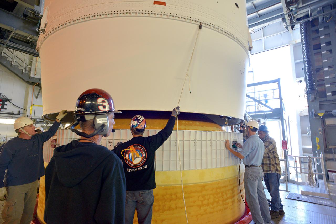 The Orion spacecraft was lifted on top of the Delta IV Heavy launch vehicle at ULA's Launch Complex 37 on Nov. 12, 2014. Over the next few days the Lockheed Martin/ULA team will work to complete the connections between Orion and the launch vehicle in preparation for Exploration Flight Test-1 (EFT-1).  Part of Batch image transfer from Flickr.