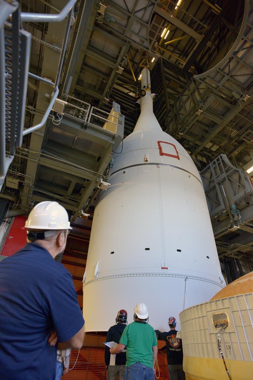 The Orion spacecraft was lifted on top of the Delta IV Heavy launch vehicle at ULA's Launch Complex 37 on Nov. 12, 2014. Over the next few days the Lockheed Martin/ULA team will work to complete the connections between Orion and the launch vehicle in preparation for Exploration Flight Test-1 (EFT-1).  Part of Batch image transfer from Flickr.