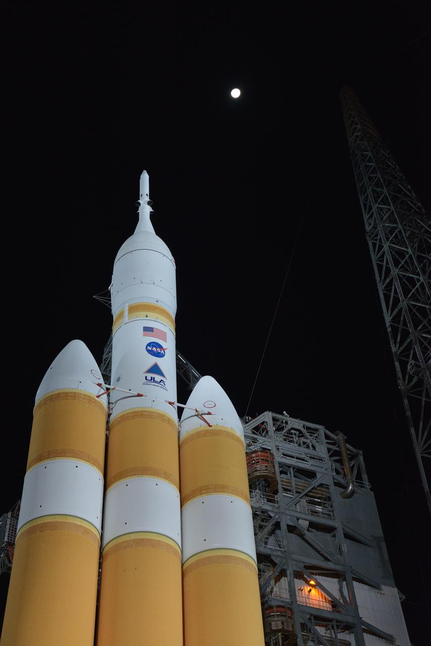 TThe full United Delta IV Heavy with Orion on top is revealed on Dec. 3, 2014 as the mobile service tower is rolled back in preparation for the 7:05 am Exploration Flight Test-1 (EFT-1) launch.  Part of Batch image transfer from Flickr.
