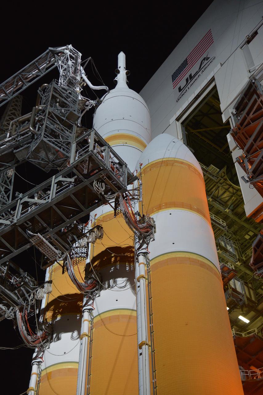 The full United Delta IV Heavy with Orion on top is revealed on Dec. 3, 2014 as the mobile service tower is rolled back in preparation for the 7:05 am Exploration Flight Test-1 (EFT-1) launch.  Part of Batch image transfer from Flickr.
