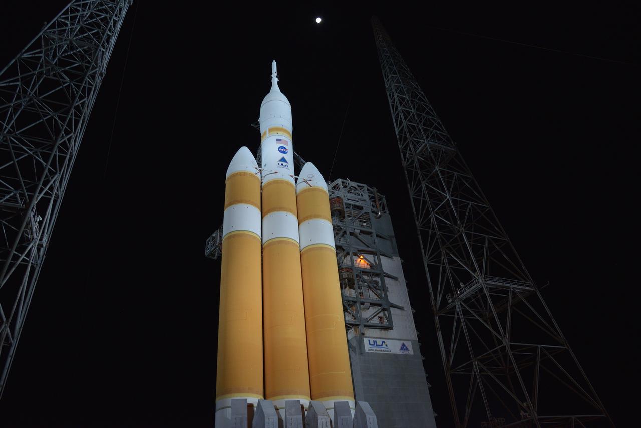 The full United Delta IV Heavy with Orion on top is revealed on Dec. 3, 2014 as the mobile service tower is rolled back in preparation for the 7:05 am Exploration Flight Test-1 (EFT-1) launch. Part of Batch image transfer from Flickr.