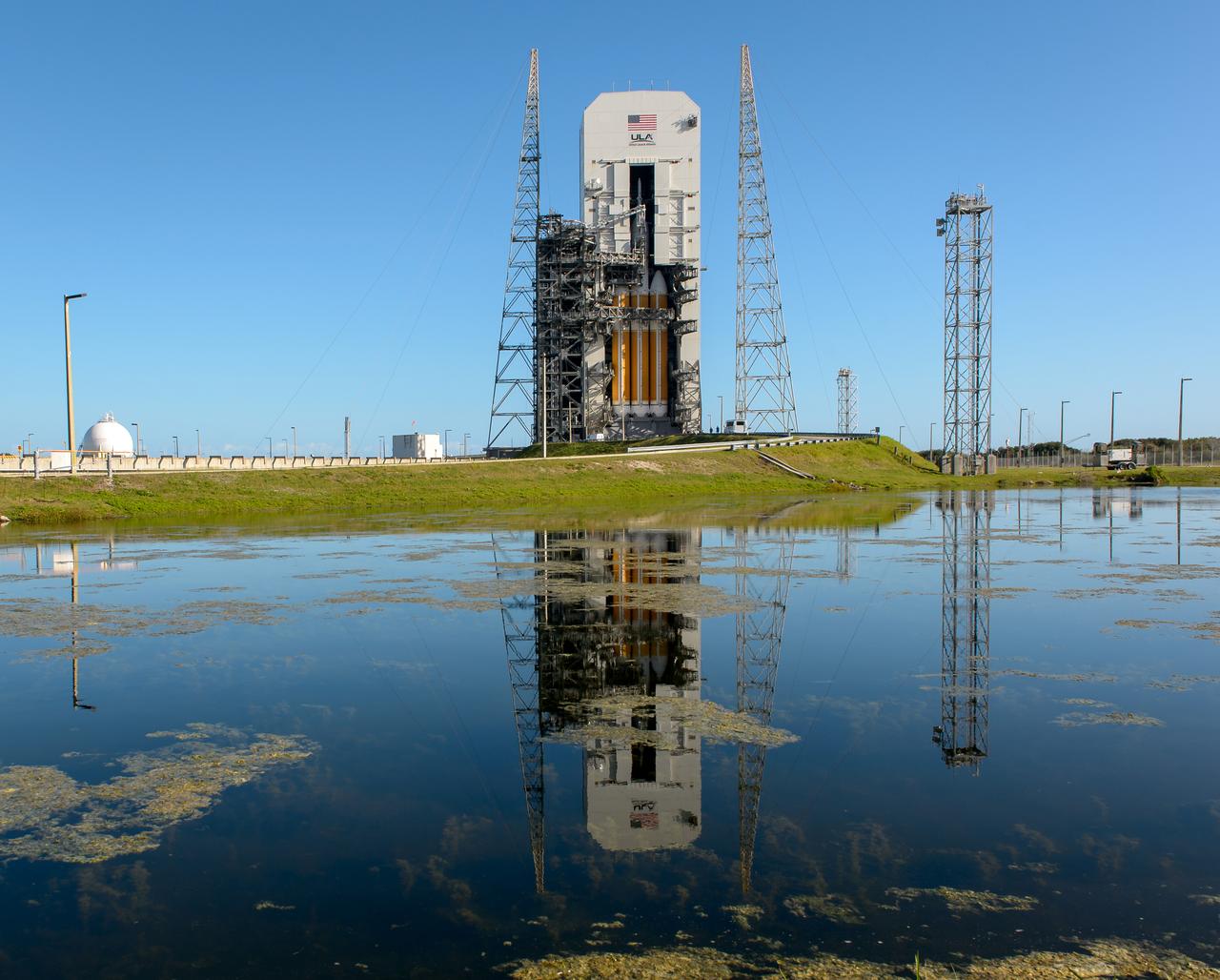 NASA’s Orion spacecraft mounted atop a United Launch Alliance Delta IV Heavy rocket is visible inside the Mobile Service Tower where the vehicle is undergoing launch preparations on Dec. 3, 2014 at Cape Canaveral Air Force Station's Space Launch Complex 37 in Florida. Part of Batch image transfer from Flickr.