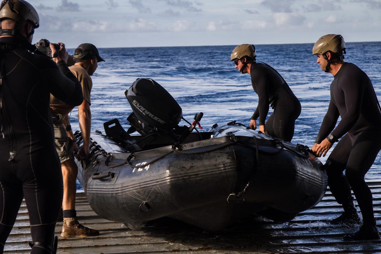 The US Navy and NASA recovery teams are on station off the cost of California on Dec. 3, 2014 and ready to recover Orion after Exploration Flight Test-1 (EFT-1) landing.   Part of Batch image transfer from Flickr.