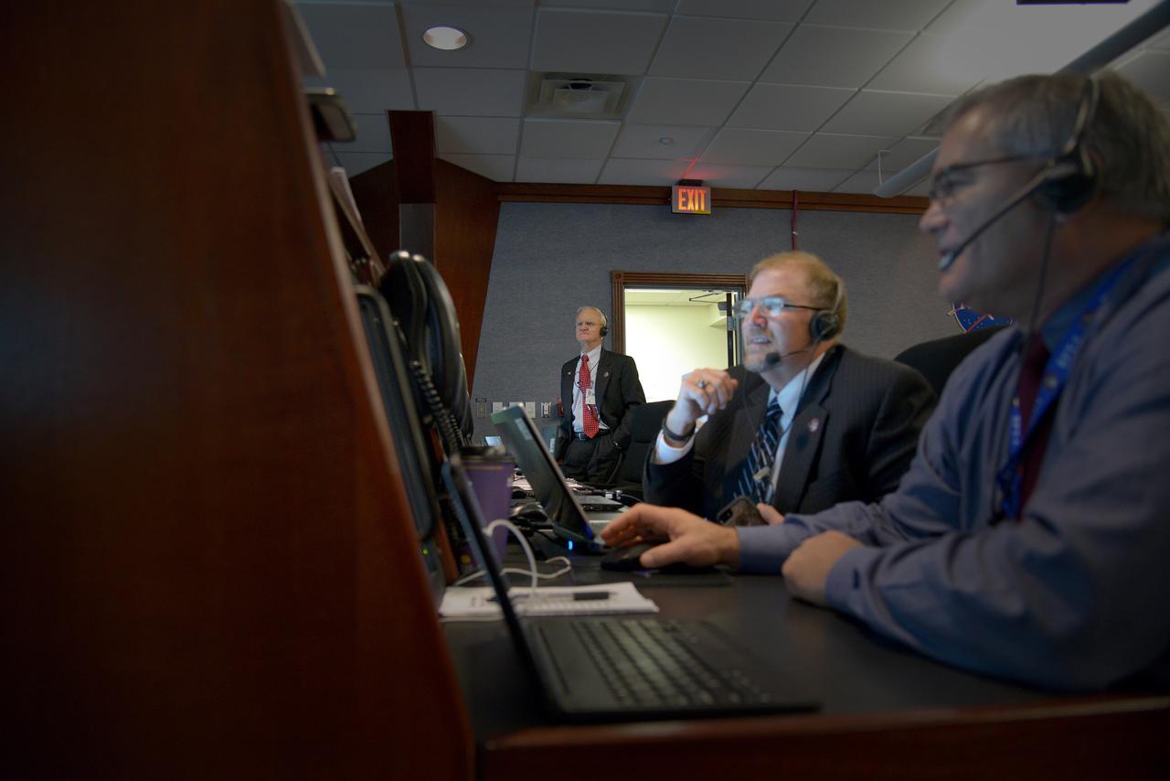The Orion team reviews the launch procedure in Building AE at Cape Canaveral Air Force Station ahead of the launch of Orion on Exploration Flight Test-1 (EFT-1) on Dec. 4, 2014. Part of Batch image transfer from Flickr.