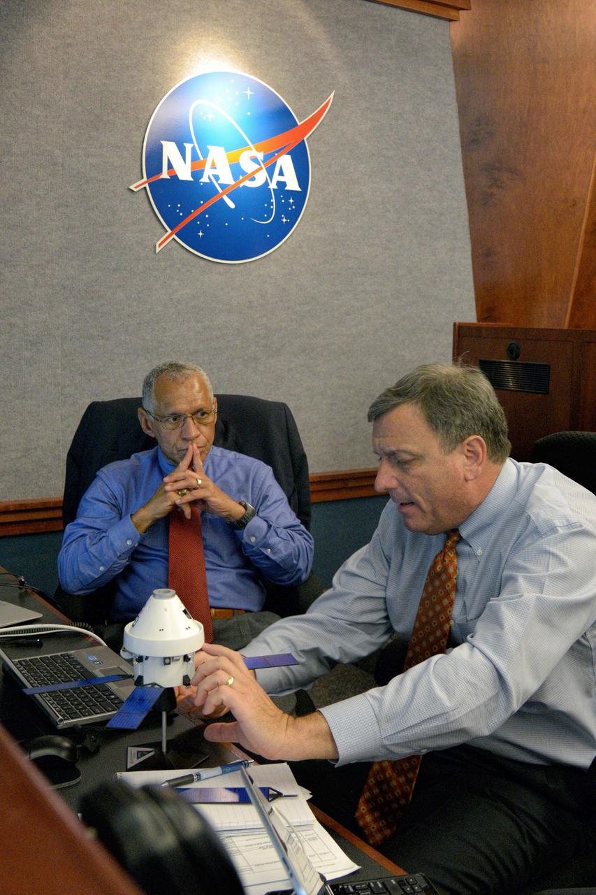 The Orion team discusses Orion operations in Building AE at Cape Canaveral Air Force Station during Exploration Flight Test-1 (EFT-1) on Dec. 5, 2014. Part of Batch image transfer from Flickr.