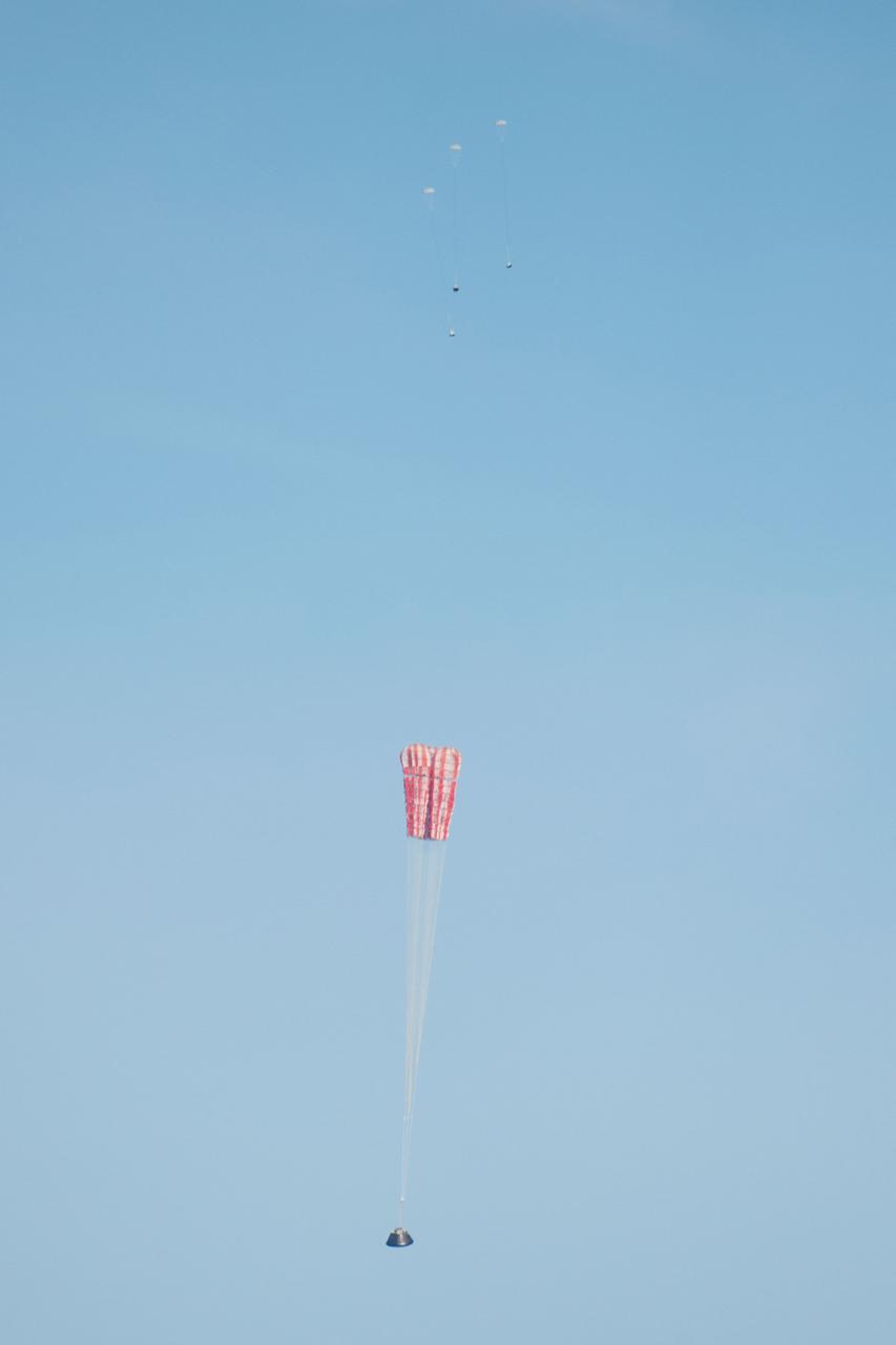 Orion's parachutes deploy as it returns to Earth after Exploration Flight Test-1 (EFT-1) on Dec. 5, 2014.  Part of Batch image transfer from Flickr.