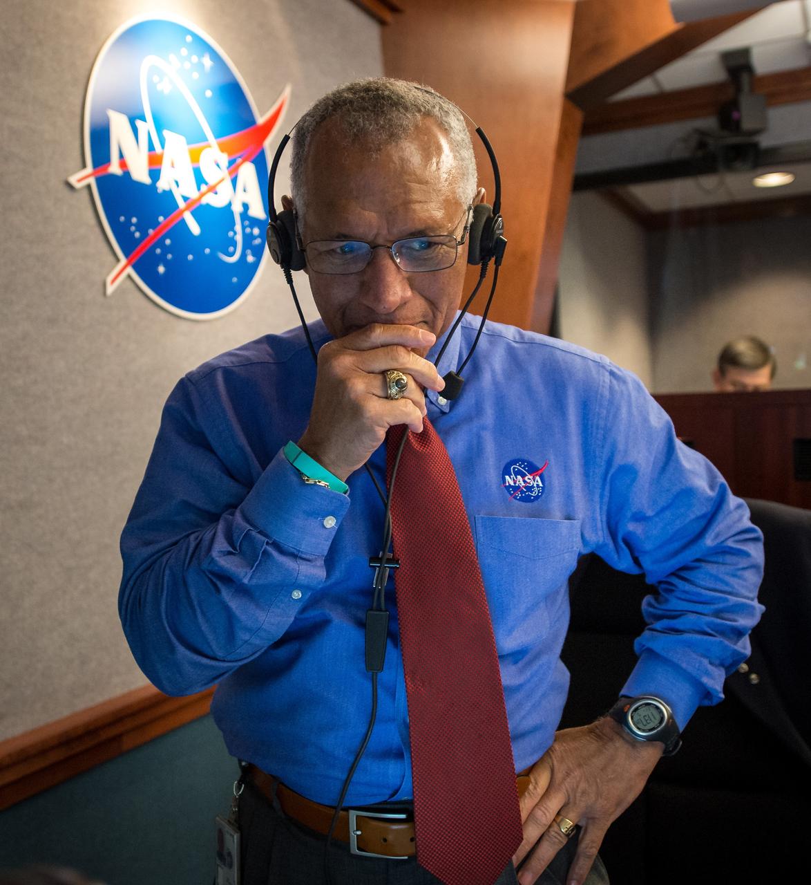 NASA Administrator Charles Bolden pauses for a moment in Building AE at Cape Canaveral Air Force Station after having watched and celebrated the Orion spacecraft splash down in the Pacific Ocean more than three hours after the spacecraft launched onboard a United Launch Alliance Delta IV Heavy rocket from Launch Complex 37, Friday, Dec. 5, 2014, Cape Canaveral, Florida. The Orion spacecraft orbited Earth twice, reaching an altitude of approximately 3,600 miles above Earth before landing. No one was aboard Orion for this flight test, but the spacecraft is designed to allow us to journey to destinations never before visited by humans, including an asteroid and Mars. Part of Batch image transfer from Flickr.