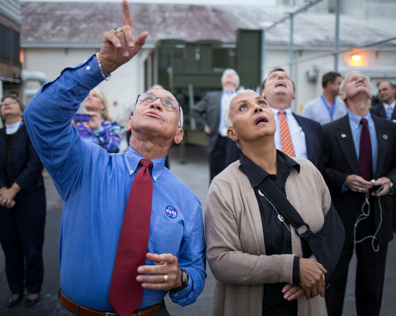 NASA Administrator Charles Bolden and his wife Jackie Bolden watch as the United Launch Alliance Delta IV Heavy rocket, with NASA’s Orion spacecraft mounted atop, lifts off on Exploration Flight Test-1 (EFT-1) from Cape Canaveral Air Force Station's Space Launch Complex 37 at at 7:05 a.m. EST, Friday, Dec. 5, 2014, Cape Canaveral, Florida. Part of Batch image transfer from Flickr.