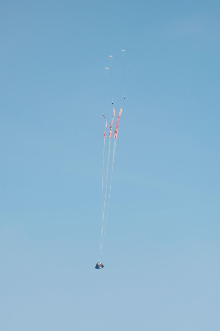Orion's parachutes deploy as it returns to Earth after Exploration Flight Test-1 (EFT-1) on Dec. 5, 2014.  Part of Batch image transfer from Flickr.