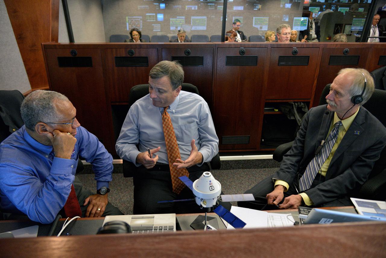 The Orion team (including NASA Administrator Charles Bolden  and  Operations Directorate William Gerstenmaier) discuss Orion operations in Building AE at Cape Canaveral Air Force Station during Exploration Flight Test-1 (EFT-1) on Dec. 5, 2014.  Part of Batch image transfer from Flickr.