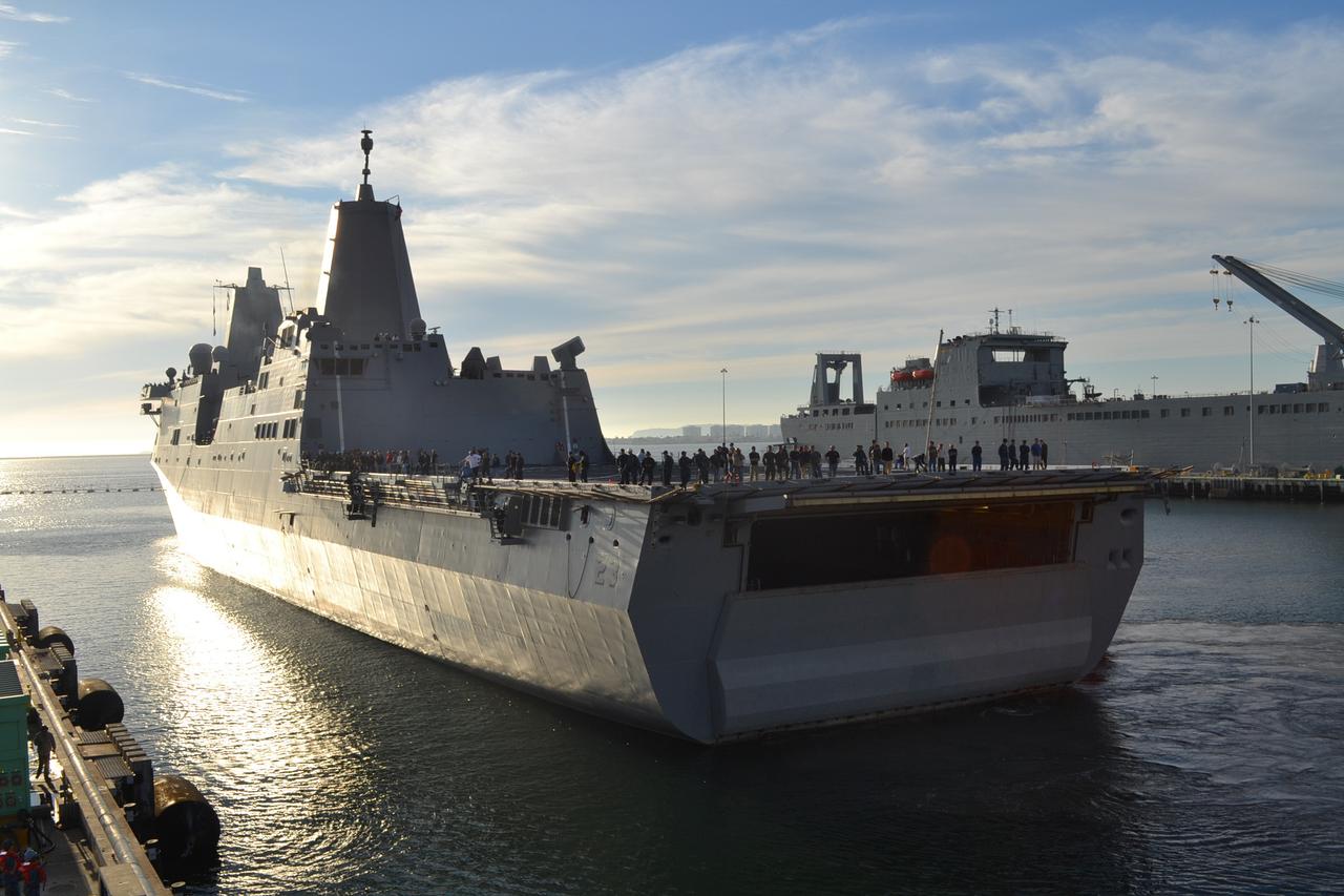 The USS Anchorage, carrying the Orion crew module, arrives in San Diego on Dec. 8, 2014. The Orion spacecraft successfully completed the first flight last week, traveling to an altitude of 3600 miles and returning to Earth at 20,000 miles per hour. The Navy and NASA team on board the USS Anchorage recovered Orion in the Pacific Ocean after splashdown.  Part of Batch image transfer from Flickr.