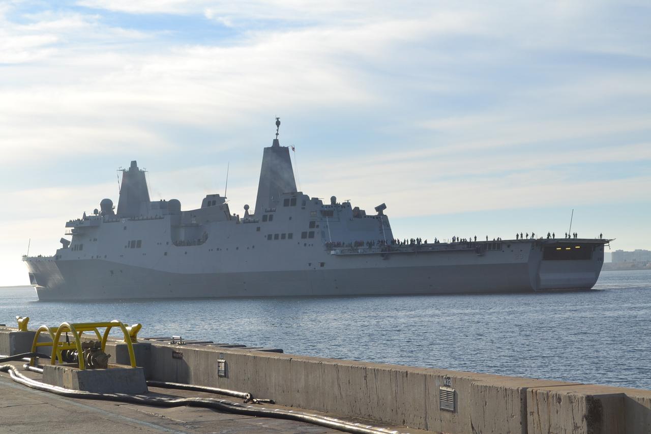 The USS Anchorage, carrying the Orion crew module, arrives in San Diego on Dec. 8, 2014. The Orion spacecraft successfully completed the first flight last week, traveling to an altitude of 3600 miles and returning to Earth at 20,000 miles per hour. The Navy and NASA team on board the USS Anchorage recovered Orion in the Pacific Ocean after splashdown.  Part of Batch image transfer from Flickr.