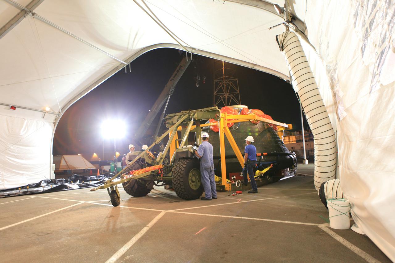 Orion arrives at Mole Pier at Naval Base San Diego on Dec. 9, 2014, where the team will prepare it for shipment back to the Kennedy Space Center in Florida.  Part of Batch image transfer from Flickr.