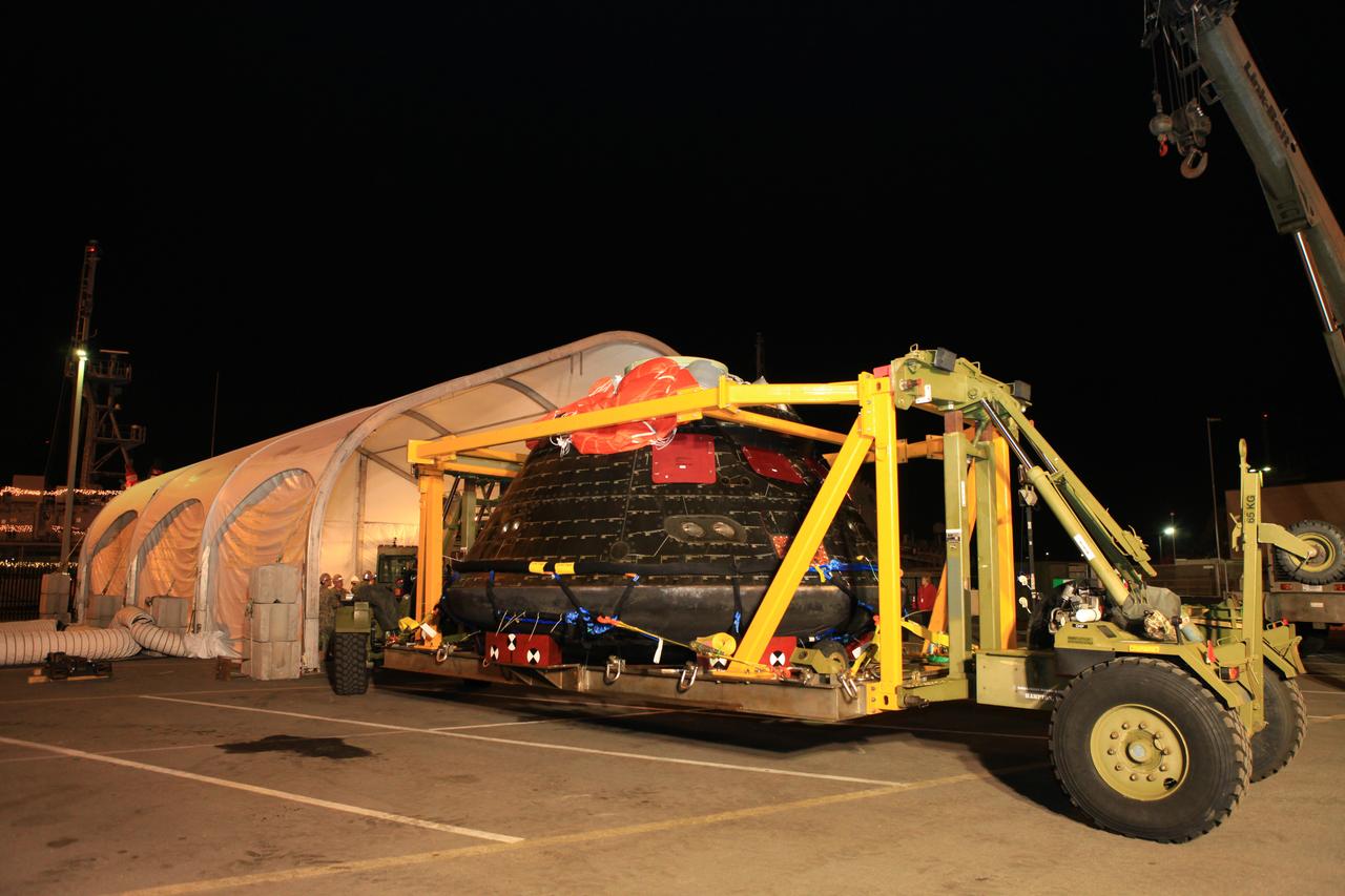 Orion arrives at Mole Pier at Naval Base San Diego on Dec. 9, 2014, where the team will prepare it for shipment back to the Kennedy Space Center in Florida.  Part of Batch image transfer from Flickr.