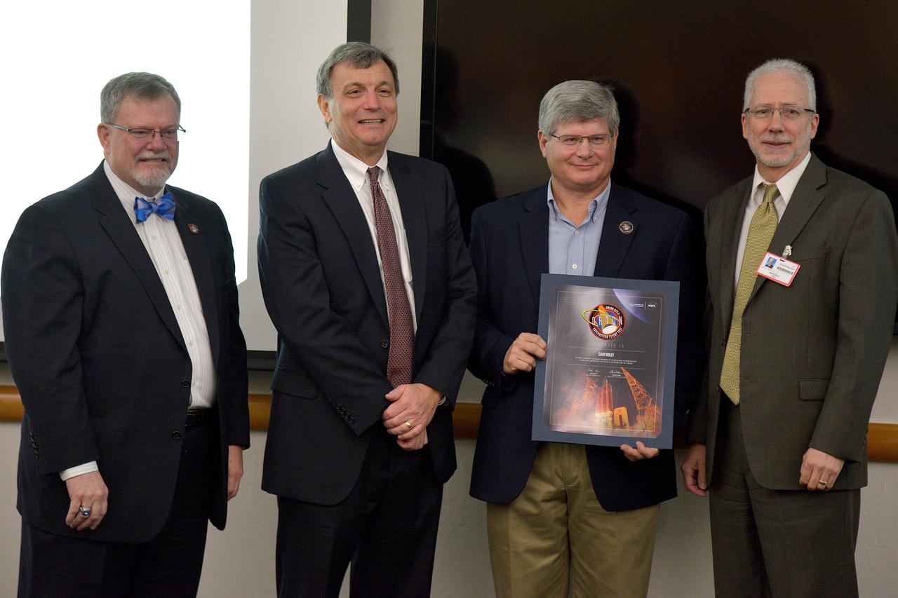 Orion leadership  (including Orion Program Manager Mark Geyer) visits Aerojet Rocketdyne in Sacramento, CA on March 3, 2015 to recognize the great work performed in support of Orion's first flight, Exploration Flight Test-1 (EFT-1). Award presented to Sam Wiley. Part of Batch image transfer from Flickr.