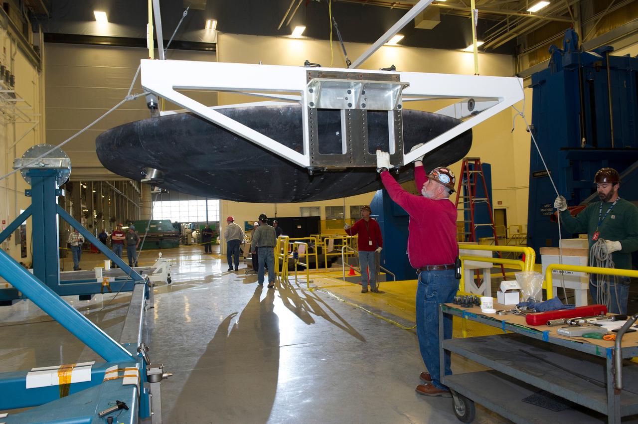 The Orion heat shield that flew on Exploration Flight Test-1 (EFT-1) in December 2014, arrives at Marshall Space Flight Center in Huntsville, Alabama for machining and post-flight evaluation on March 9, 2015. Part of Batch image transfer from Flickr.