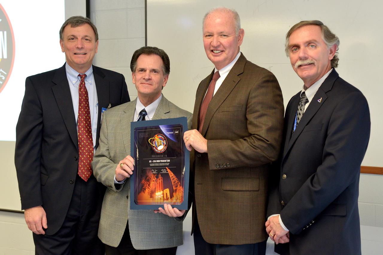 The Orion team congratulates the Orbital ATK team in Promontory, Utah on their efforts in making Exploration Flight Test-1 (EFT-1) a success on March 11, 2015. An award is presented to the ATK-Utah Orion Program Team. Part of Batch image transfer from Flickr.