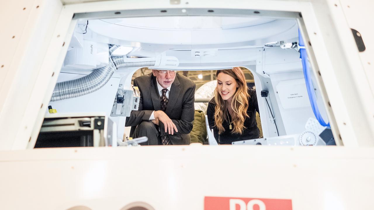CNN's Rachel Crane talks to Orion program manager, Mark Geyer, at the Space Vehicle Mockup Facility at NASA's Johnson Space Center in Houston on June 23, 2015. Part of Batch image transfer from Flickr.