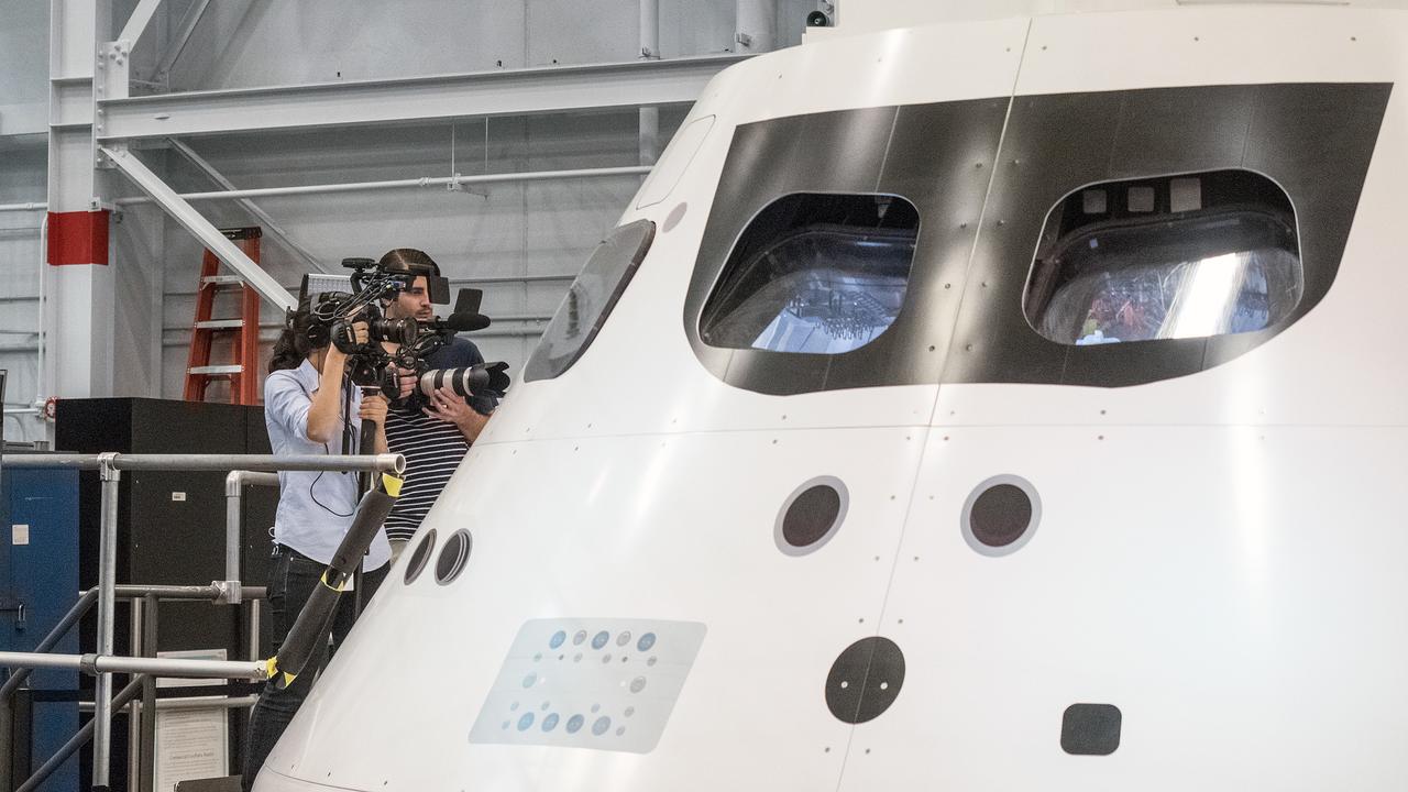 CNN's Rachel Crane talks to Orion program manager, Mark Geyer, at the Space Vehicle Mockup Facility at NASA's Johnson Space Center in Houston on June 23, 2015. Part of Batch image transfer from Flickr.