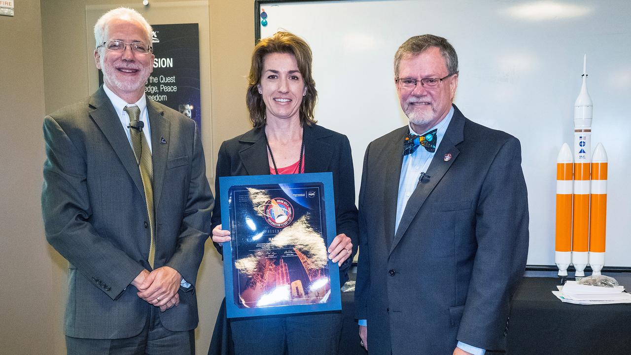 The Orion team visits United Launch Alliance in Denver, Colorado on July 14, 2015 to recognize their efforts in making Exploration Flight Test-1 (EFT-1) a success. Orion program manager, Mark Geyer, presents award. Part of Batch image transfer from Flickr.