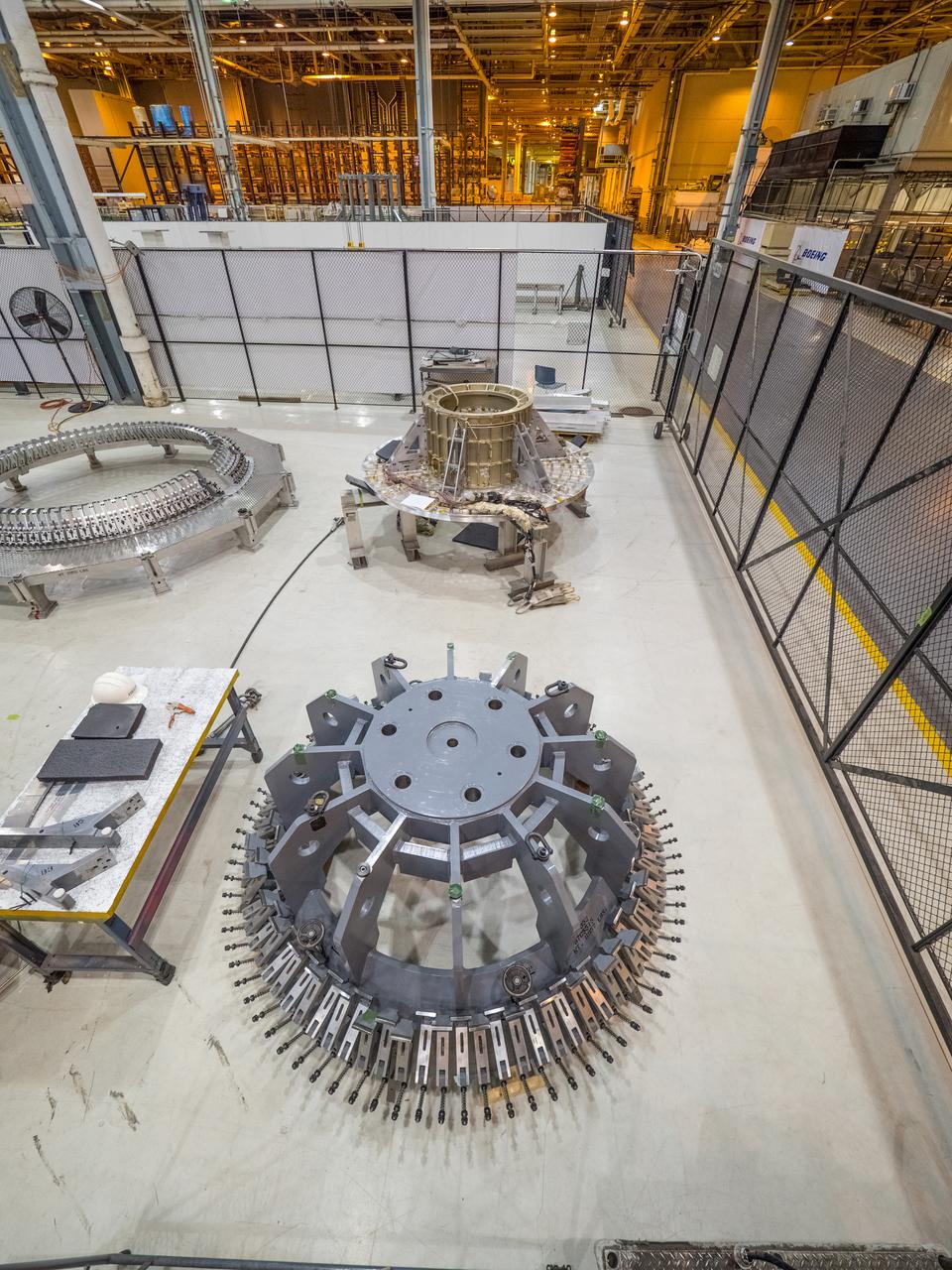 Pieces for the Orion spacecraft that will fly on Artemis I are prepared for welding at NASA's Michoud Assembly Facility in New Orleans, Louisiana on Aug. 6, 2015. Part of Batch image transfer from Flickr.